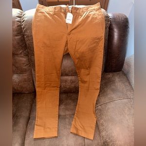 ***7 pairs*** of men's chino pants/jeans, all 31x32 slim fit that taper